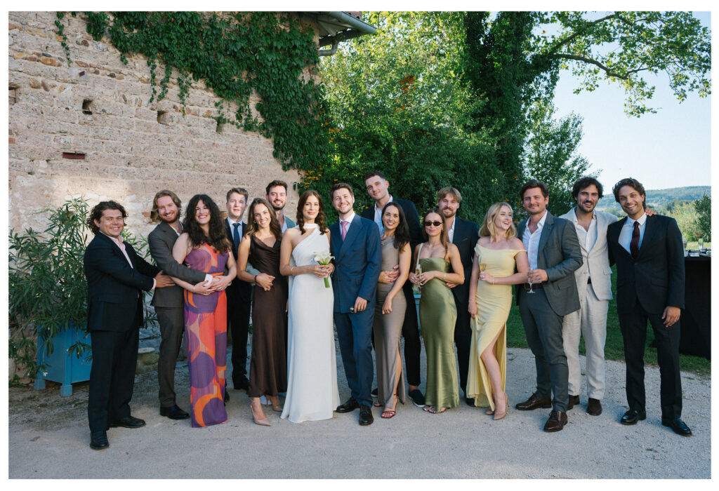 Candid family group photo after intimate ceremony in Toulouse.