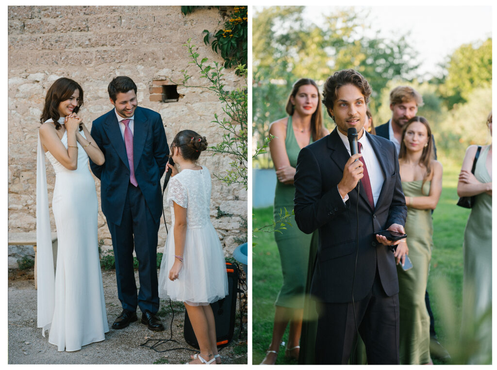 Wedding guest giving heartfelt speech during outdoor reception at French countryside wedding.