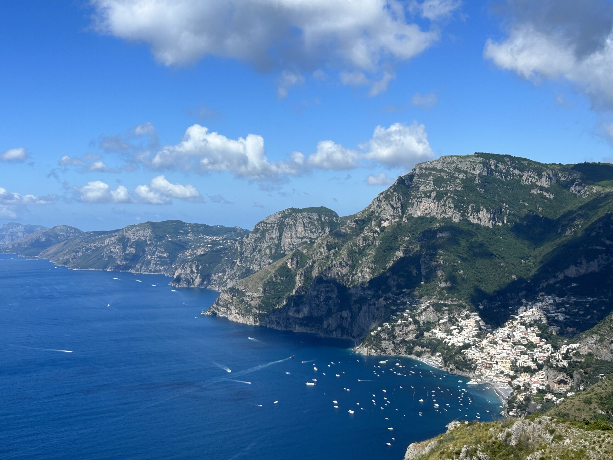 Breathtaking Positano coastline view from the sea — the perfect backdrop for romantic Amalfi Coast proposals.
